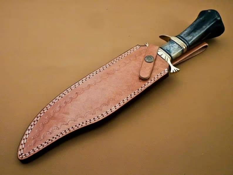 Wilderness Guardian: Bowie Knife with Twist Damascus Steel Blade, Bone Handle, Brass Guards, and Leather Sheath (SC)